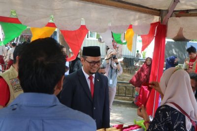 Kepala Dinas Perdagangan (Disdag) Kota Makassar, Arlin Ariesta hadiri perayaan HUT RI ke-77 di Anjungan Pantai Losari, Rabu (17/08/2022).