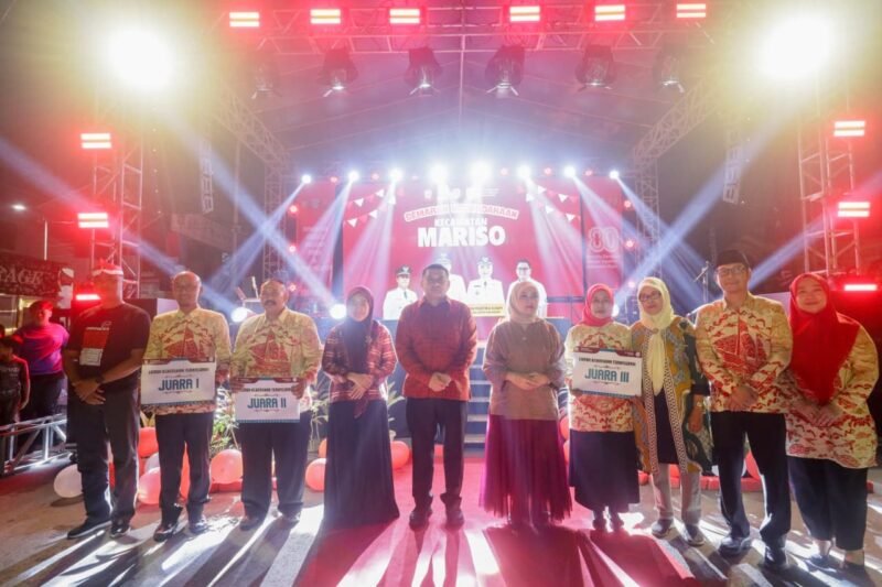 Wali Kota Makassar, Munafri Arifuddin bersama Wakil Wali Kota, Aliyah Mustika Ilham, serta Ketua TP PKK Makassar, Melinda Aksa, menghadiri Pesta Rakyat Mariso Spektakuler yang digelar di Kelurahan Mariso, Kecamatan Mariso, Selasa (19/8/2025) malam