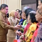 Munafri Arifuddin dan Aliyah Mustika Ilham dalam Perayaan Natal Pemerintah Kota Makassar, yang digelar perdana untuk ASN lingkup Pemkot Makassar di Hotel Myko, Selasa (20/1/2026)